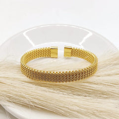 BRAZALETE DORADO ABIERTO ACERO