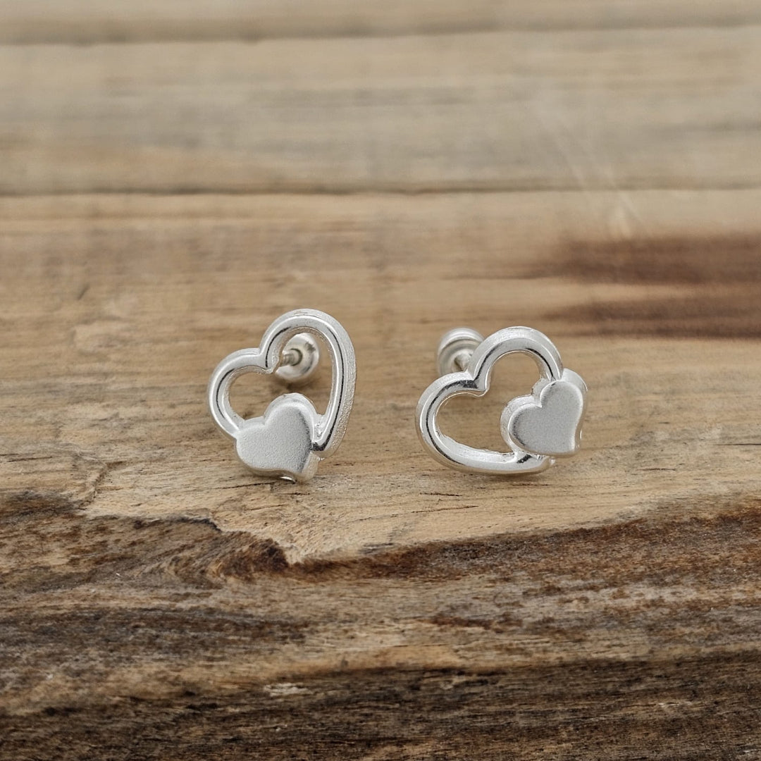 BROQUEL CORAZON SILUETA PLATA .925