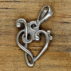 DIJE CORAZON MUSICAL PLATA .925