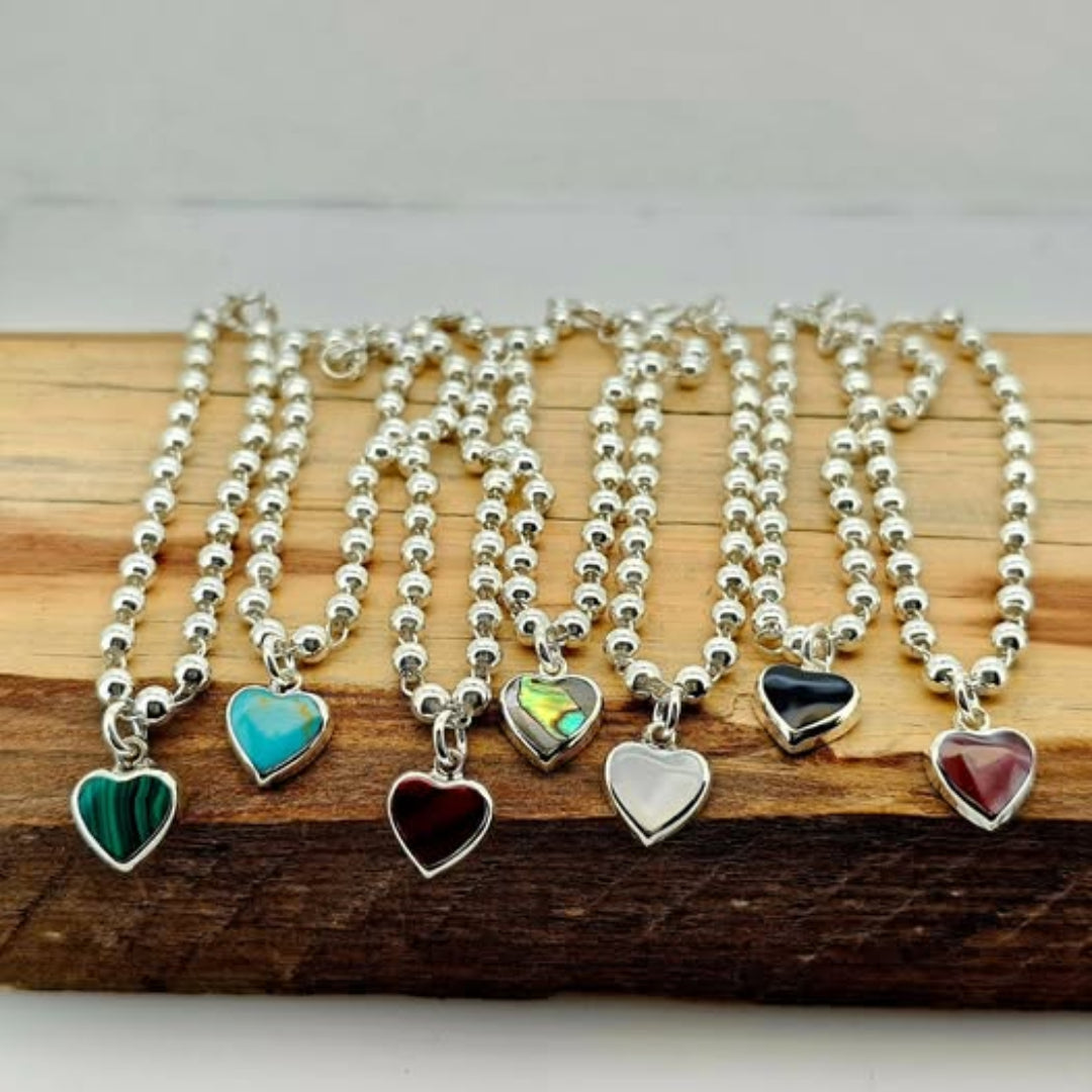 PULSO BOLITAS C/CORAZON PN PLATA .925