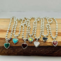 PULSO BOLITAS C/CORAZON PN PLATA .925