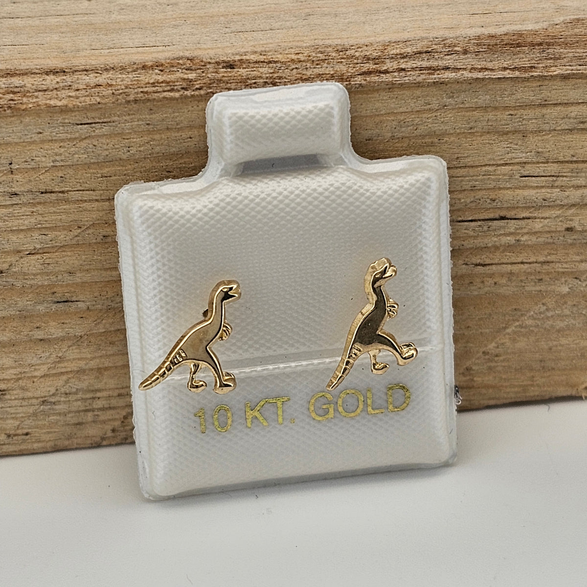 BROQUEL T-REX ORO 10K