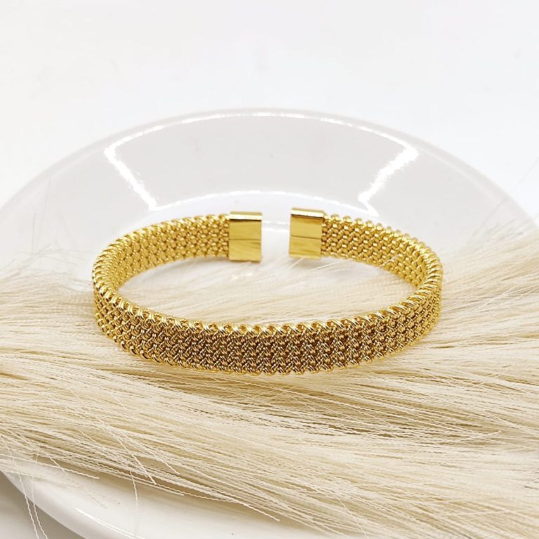 BRAZALETE DORADO ABIERTO ACERO